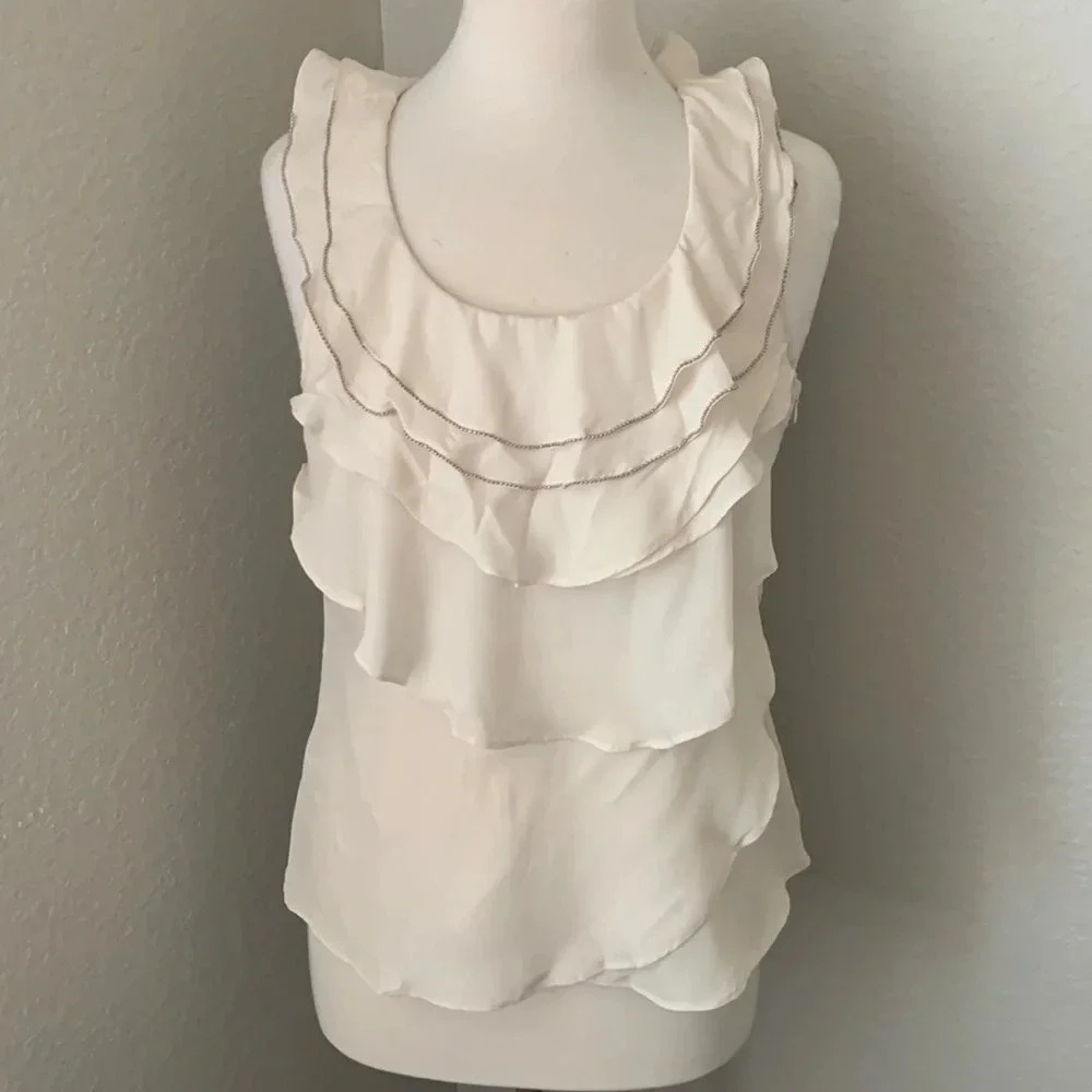 BODY CENTRAL cream colored ruffle top with beaded neck details